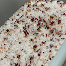 Load image into Gallery viewer, Indulge in our luxurious 600-gram bath salts, designed to soothe and relax after a long day. Made with a blend of magnesium and Himalayan rock salt, these bath salts are available in two delightful options: •Lavender essential oil with lavender petals •Rose essential oil with miniature rose petals Perfect for unwinding and rejuvenating your senses.