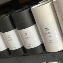 Load image into Gallery viewer, Indulge in our luxurious 600-gram bath salts, designed to soothe and relax after a long day. Made with a blend of magnesium and Himalayan rock salt, these bath salts are available in two delightful options: •Lavender essential oil with lavender petals •Rose essential oil with miniature rose petals Perfect for unwinding and rejuvenating your senses.