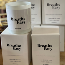 Load image into Gallery viewer, eucalyptus blend candle in a 300-gram white glass vessel, featuring 1 cotton wick. Infused with essential oils of eucalyptus, peppermint, menthol, and a hint of lavender. Boxed and perfect for easing blocked noses in winter.”