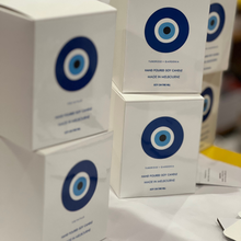 Load image into Gallery viewer, 300g handpoured Cocosoy candle with a single cotton wick, featuring an Evil Eye design, beautifully boxed and ready for gifting.