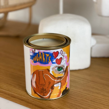 Load image into Gallery viewer, A 420-gram cocosoy candle in a paint tin with artwork by Lachlan Muller, featuring a gloss laminate finish and up to 80 hours of burn time. Perfect for upcycling into a pen holder or makeup brush holder.