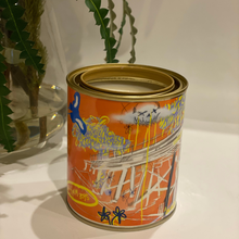 Load image into Gallery viewer, A 420-gram cocosoy candle in a unique paint tin with artwork by Lachlan Muller, gloss laminate finish, and up to 80 hours of burn time. Ideal for upcycling into a pen holder or makeup brush holder.