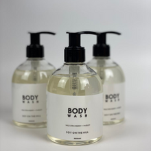 Load image into Gallery viewer, A PET pump bottle of Australian-made body soap, free from parabens, mineral oil, phthalates, formaldehyde, palm oil, and PEGs. Non-GMO, cruelty-free, vegan-friendly, with a unisex wild strawberry and parsley fragrance.