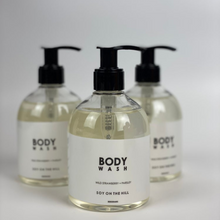 Load image into Gallery viewer, A PET pump bottle of Australian-made body soap, free from parabens, mineral oil, phthalates, formaldehyde, palm oil, and PEGs. Non-GMO, cruelty-free, vegan-friendly, with a unisex wild strawberry and parsley fragrance.
